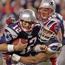 Bills DE Aaron Schobel with one of his 12 career sacks of Tom Brady